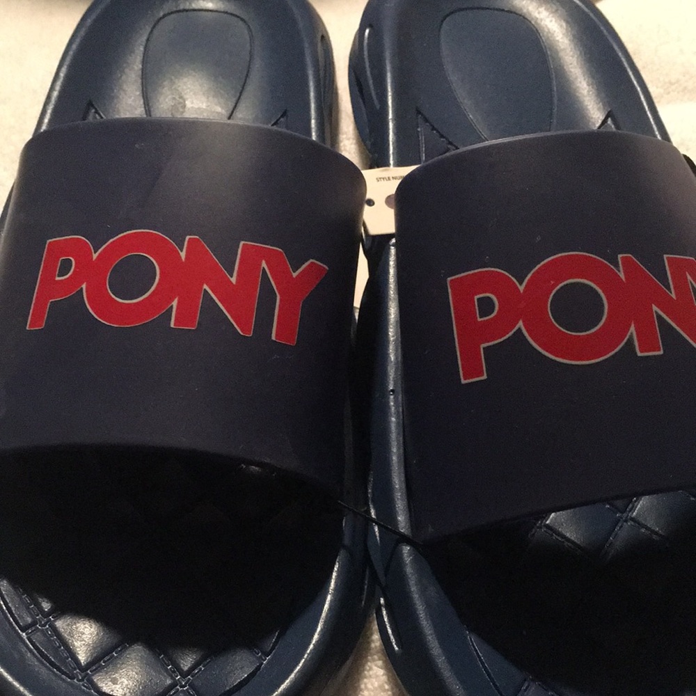 PONY slides navy blue.